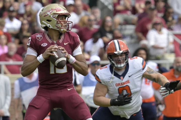 Jordan Travis has a hand in 3 touchdowns and Florida State's defense stymies Syracuse in a 41-3 win