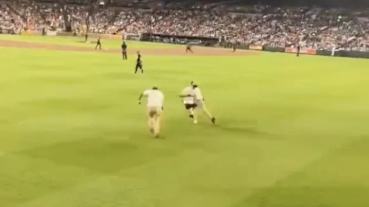 Baltimore Orioles Fan on the Field Quickly Embarrassed By Security