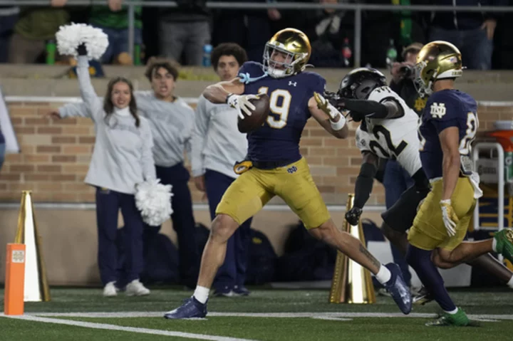 Hartman throws 4 TDs to lead No. 20 Notre Dame to 45-7 win over his former team Wake Forest