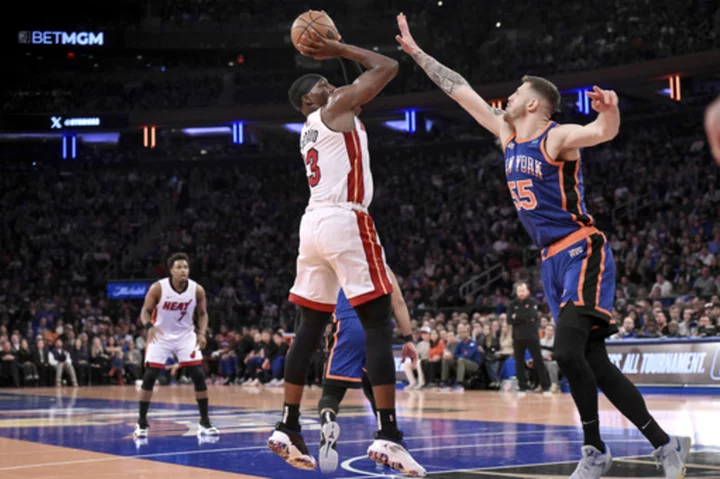 Knicks come from 21 down to beat Heat 100-98 and stay alive in the In-Season Tournament