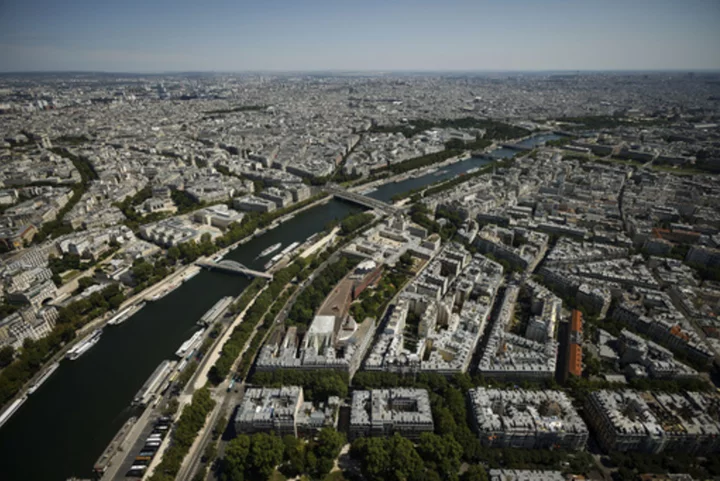 Rains set back test of Paris' preparations for Olympic swimming in the Seine