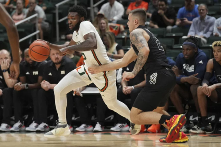 No. 12 Miami rallies from 2nd-half deficit, then holds off crosstown rival FIU 86-80