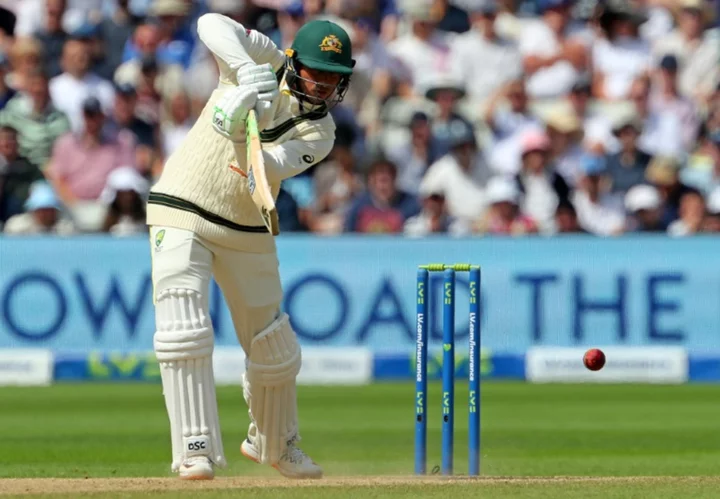 Australia's Khawaja holds firm as Ashes opener heads towards climax