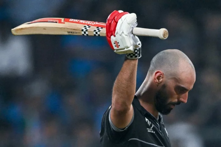 Ton-up for Mitchell but New Zealand lose Williamson in semi-final chase