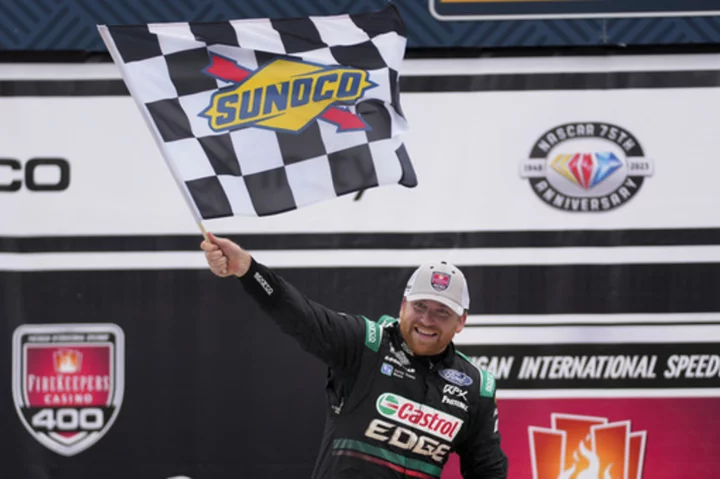 AUTO RACING: Buescher wins back to back at Richmond and Michigan, outlasting points leader Truex