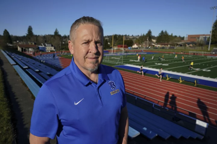 After years of fighting, a praying football coach got his job back. Now he's unsure he wants it