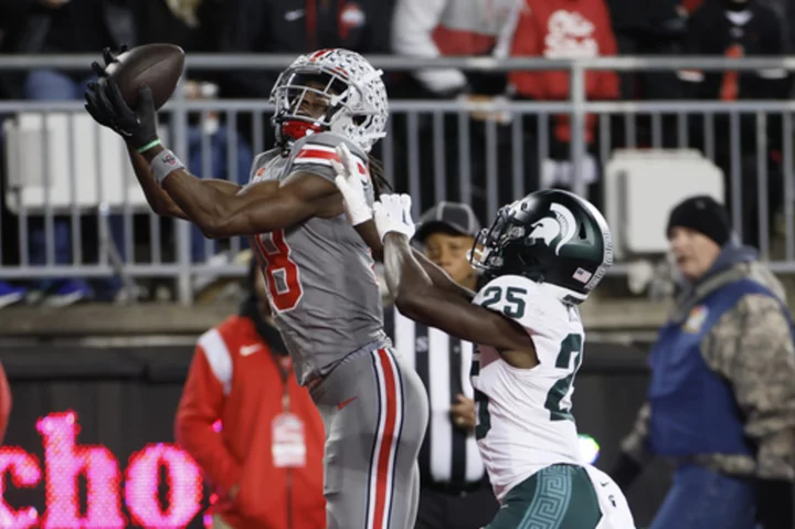 Marvin Harrison Jr. paces quick-strike Ohio State in 38-3 rout of Michigan State