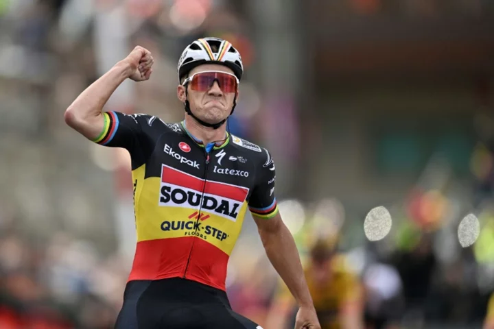 Evenepoel powers to Vuelta stage three win and takes red jersey