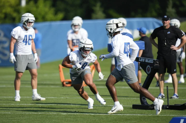 Suddenly respectable Detroit Lions try not to buy into hype as training camp opens