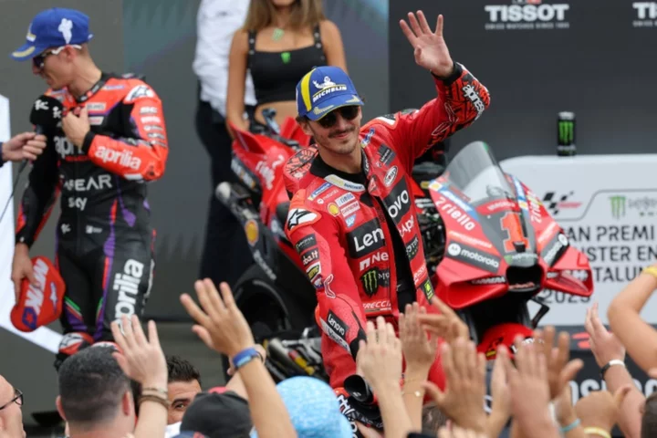 Bagnaia overcomes horror crash to defend MotoGP lead on home turf