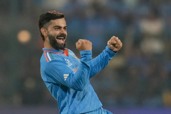 Kohli's rare wicket entertains the India crowd in a big Cricket World Cup win over Netherlands