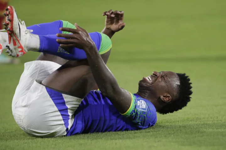 Real Madrid's Vinícius expected to miss nearly two months after tearing leg muscle on Brazil duty