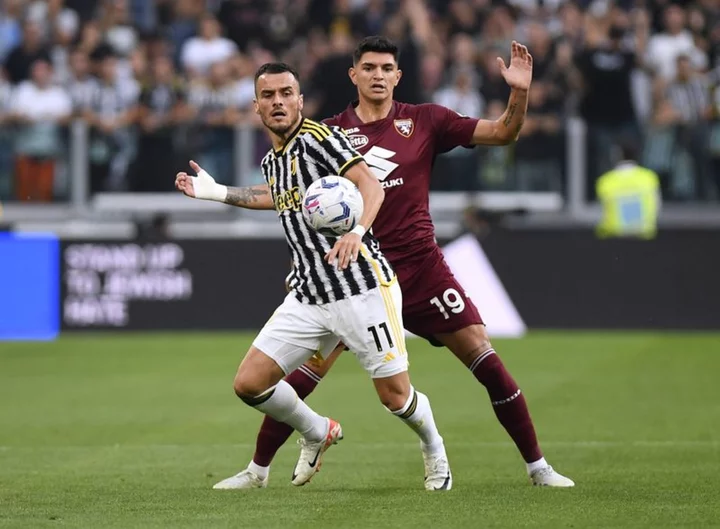 Soccer-Clinical Juventus go third after derby win against Torino