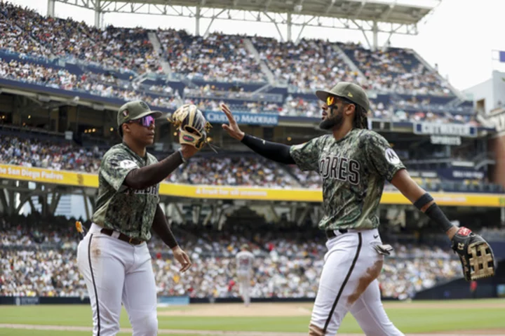 Odor, Carpenter have big hits as struggling Padres beat Red Sox 7-0