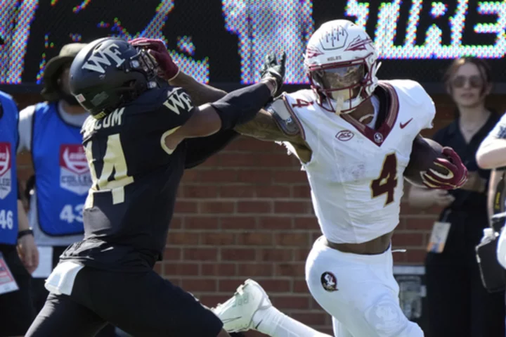 Coleman and Travis help No. 4 Florida State roll past Wake Forest 41-16 to stay unbeaten