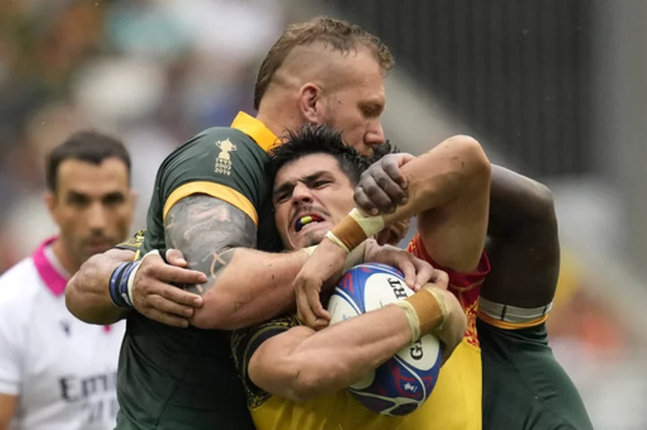 AP PHOTOS: Big teams flex their muscles in the 2nd round of games at the Rugby World Cup